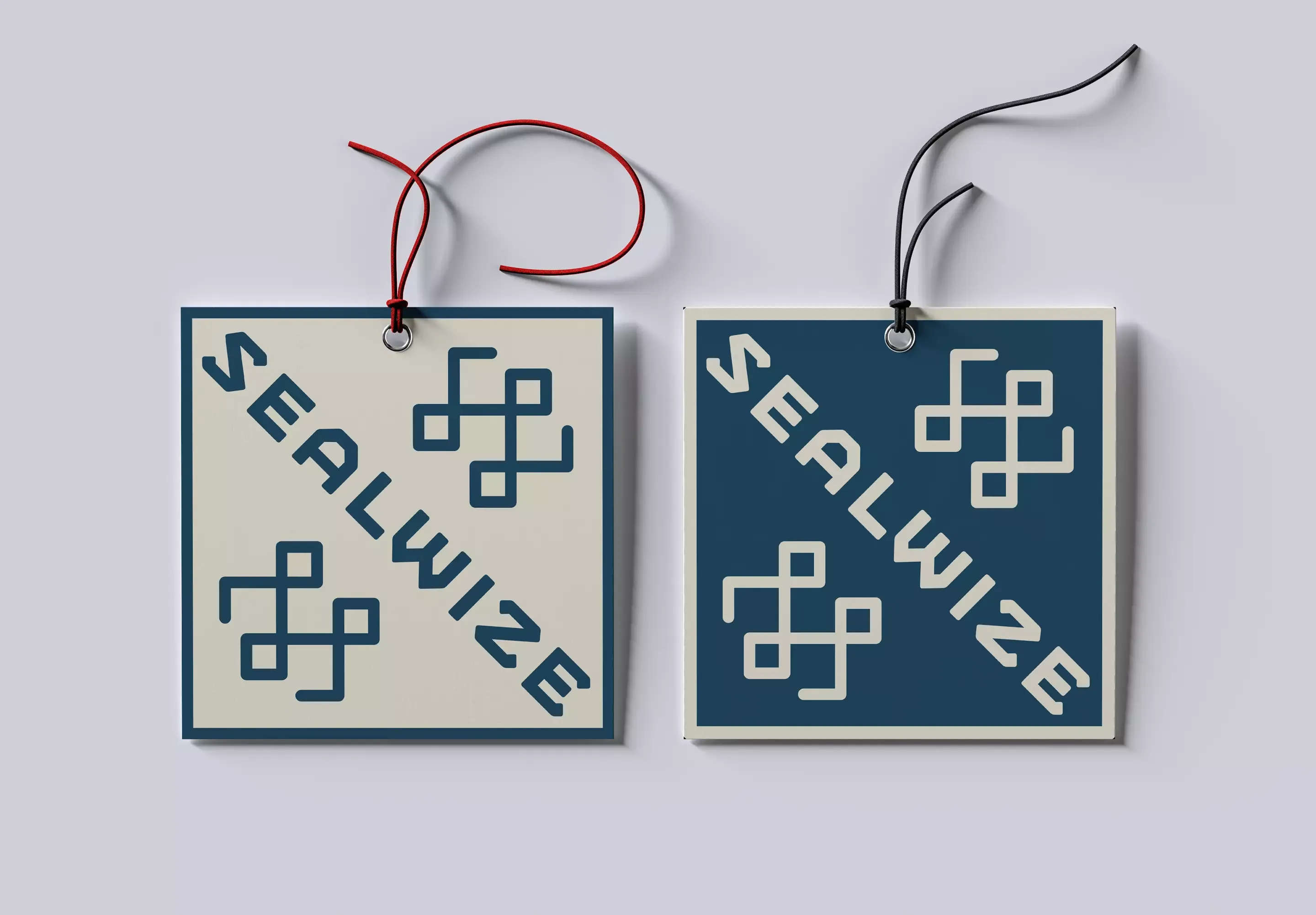 Sealwise branded product labels in light and dark colorways with the geometric diamond icon