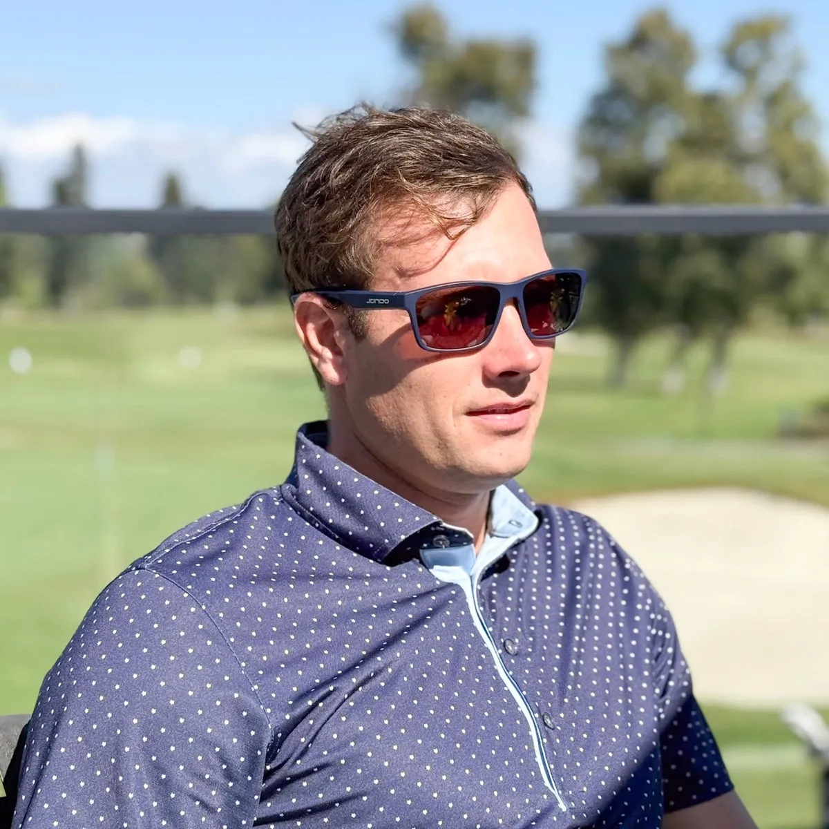 JondoSport Gimme model sunglasses lifestyle photo showing sporty frame design for active golfers